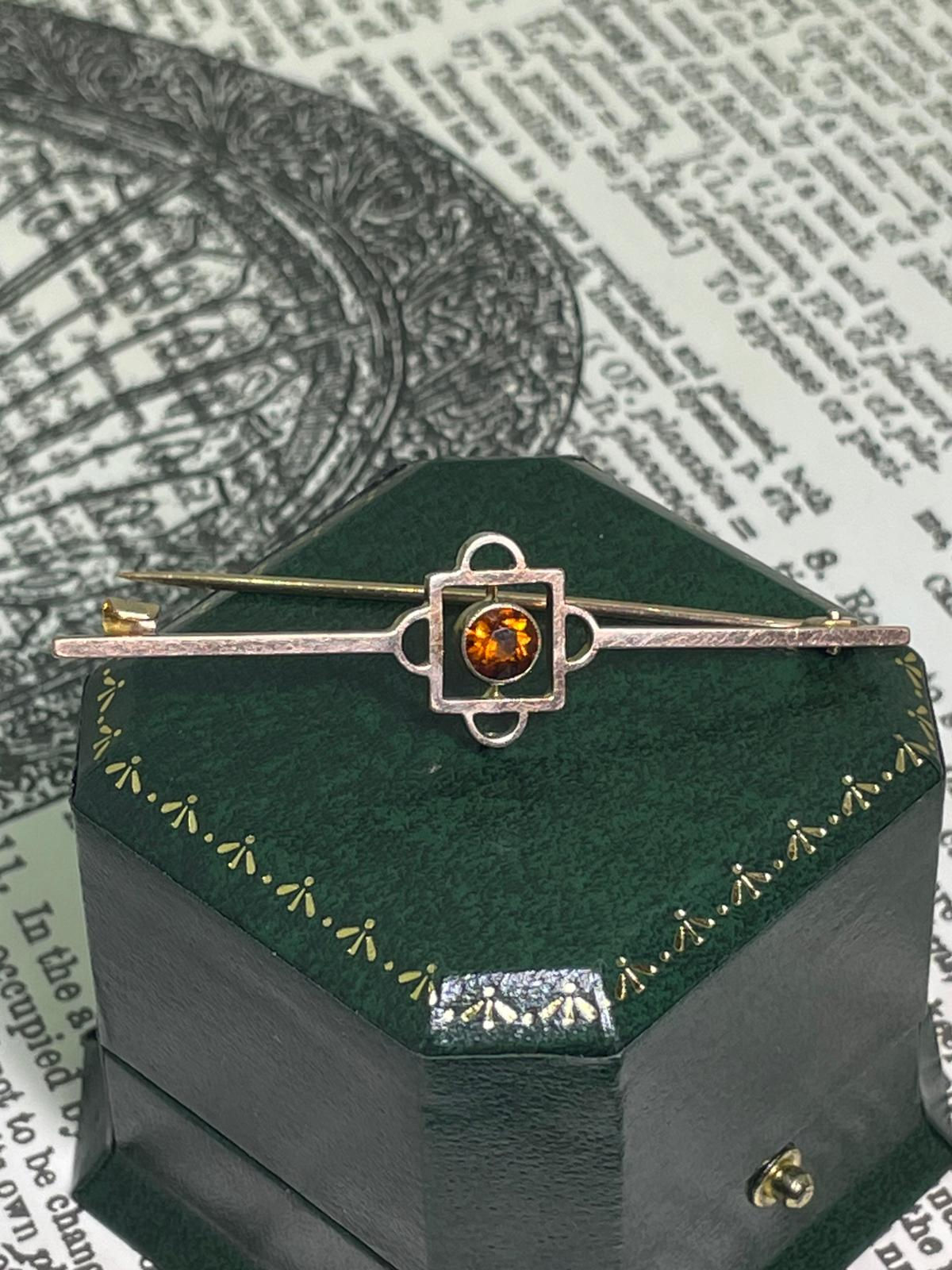 An Art-Deco, circa 1930's 9K Gold & Madeira Citrine Bar Brooch