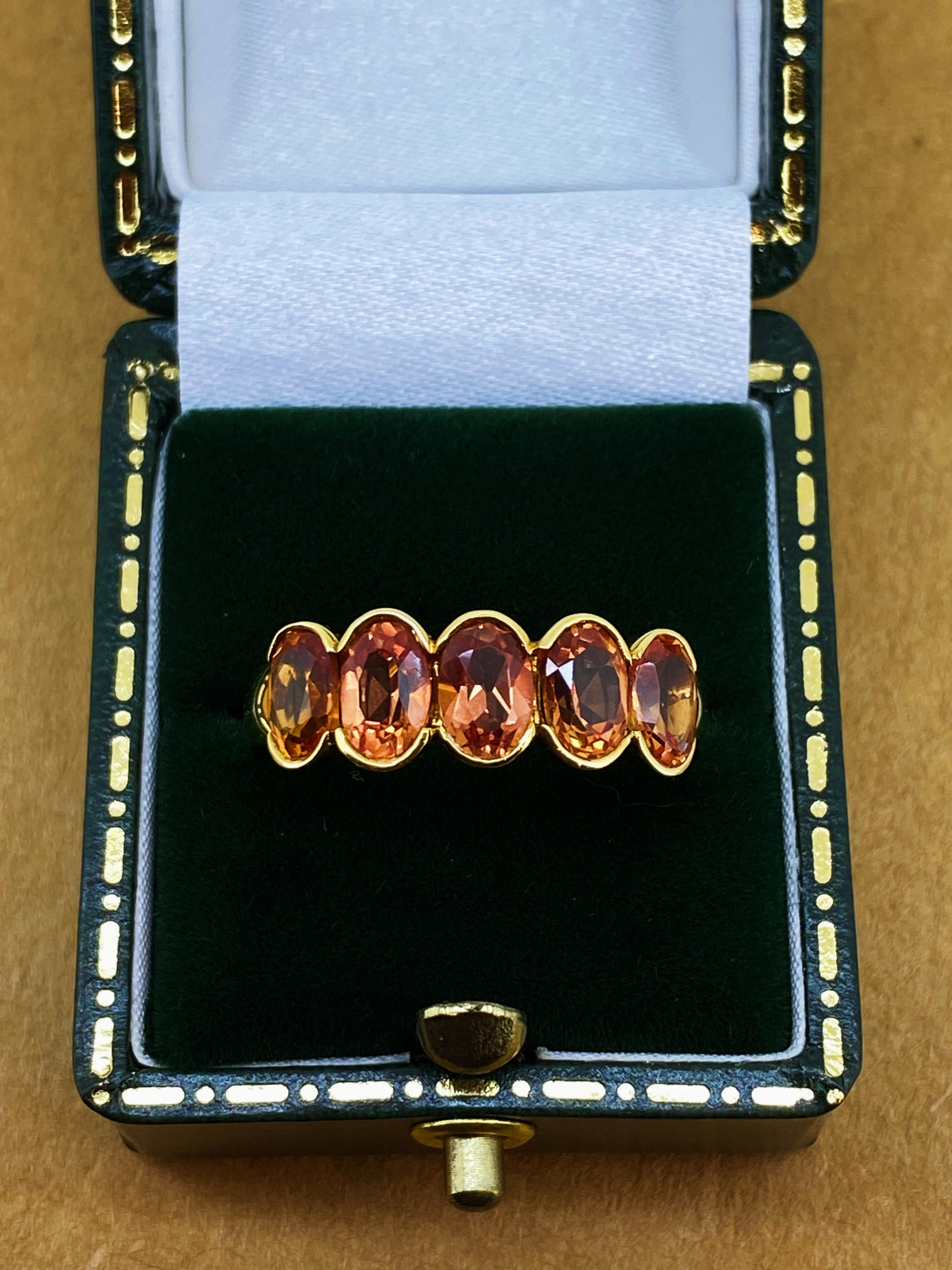 5-Stone 3.75ct Orange Sapphire Half-Hoop Ring in 18K Yellow Gold Valued at $8500