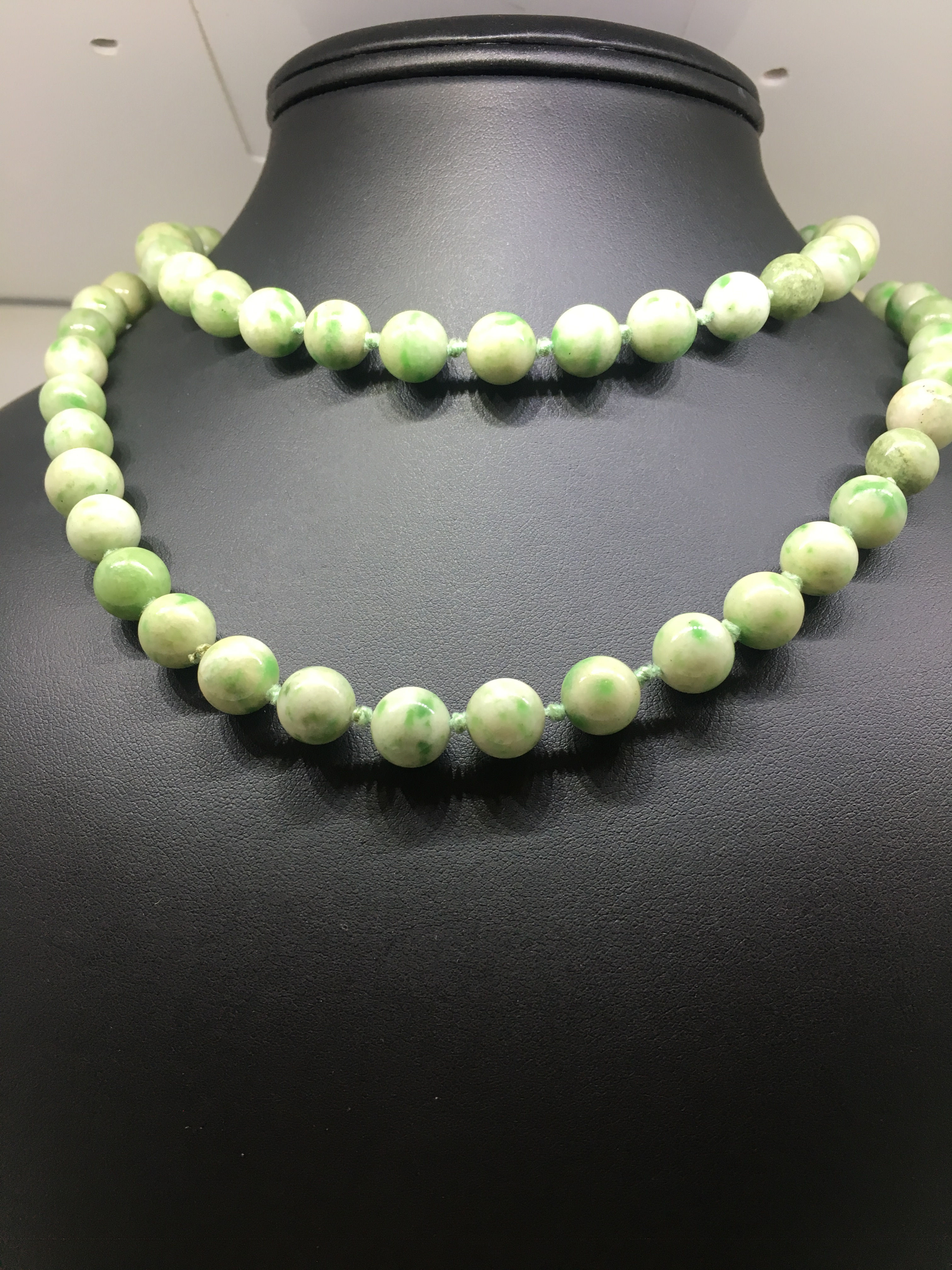 An Opera Length 11mm Jade Bead Necklace