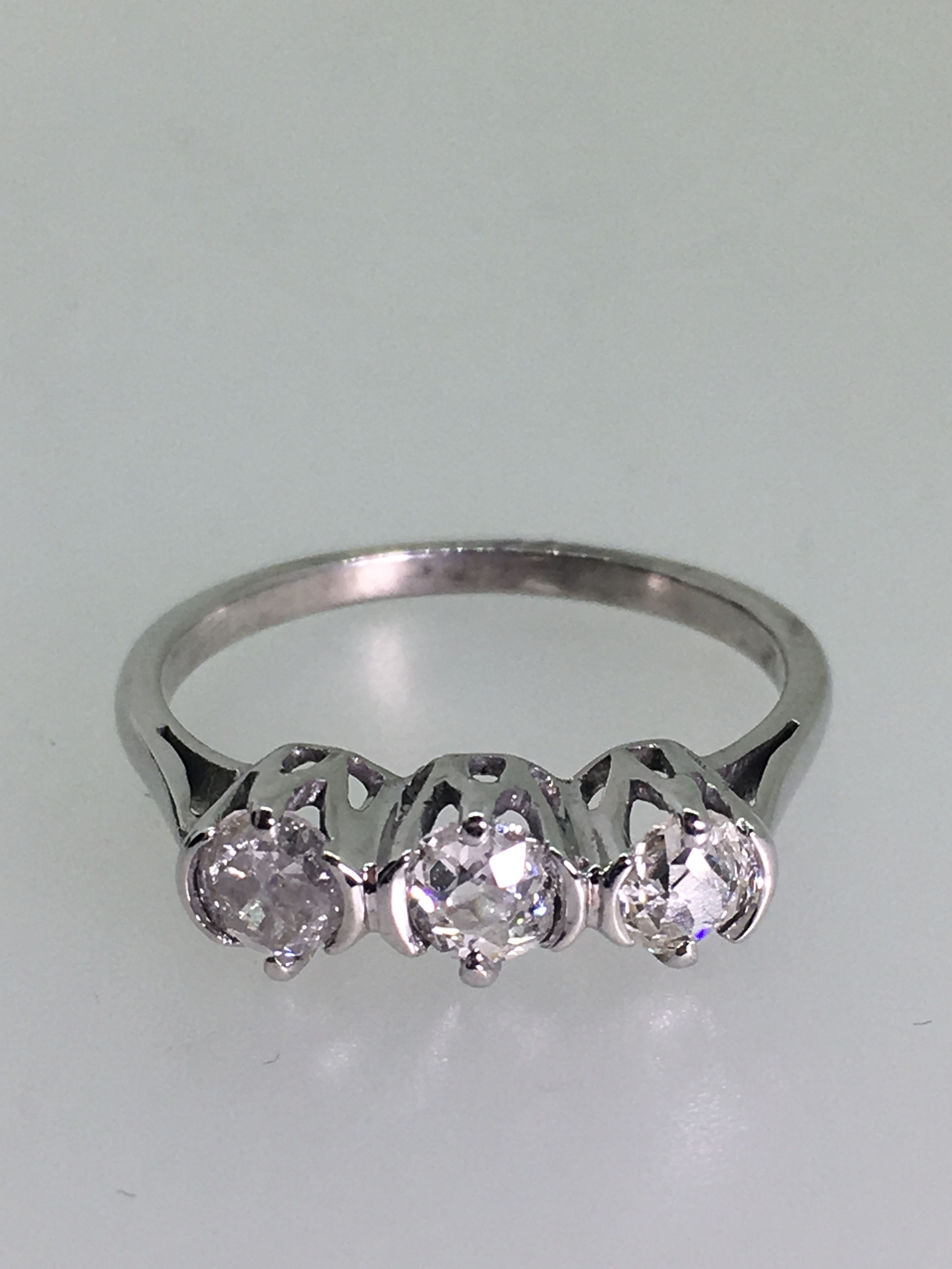 Three Stone Old Cut Diamond Ring in Platinum