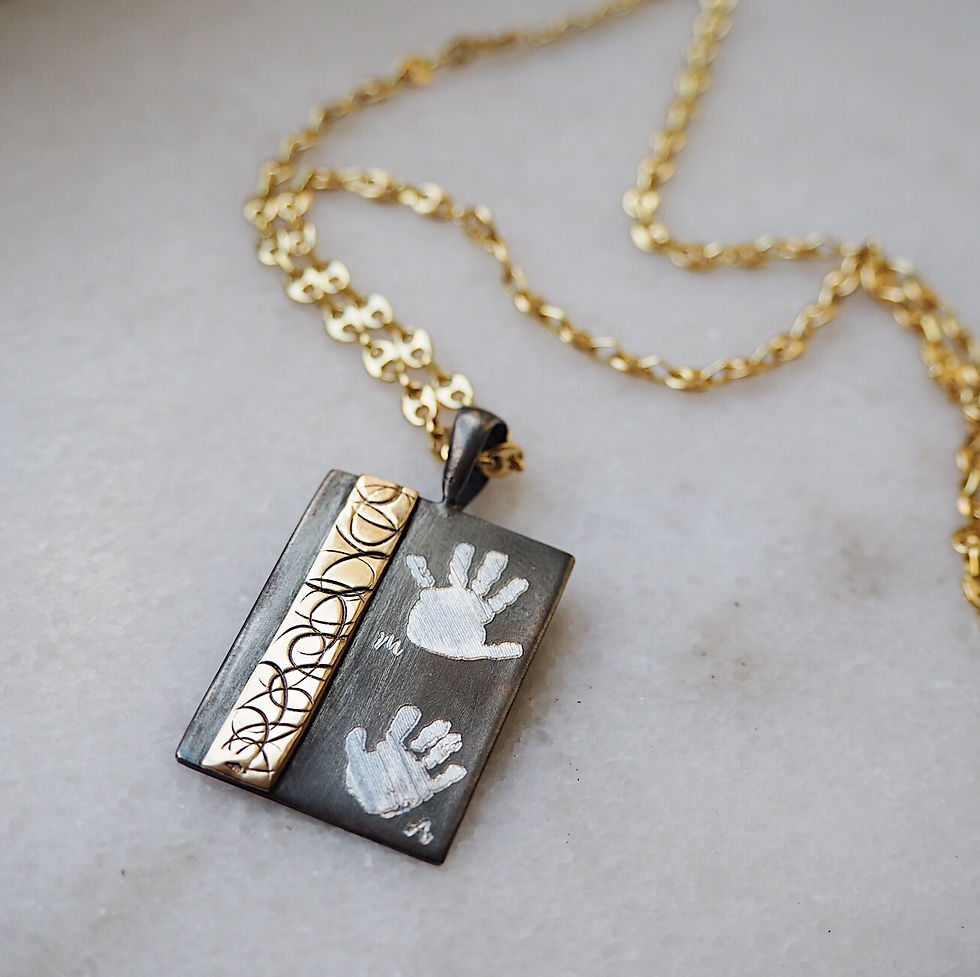 Halskette aus Silber und Gold