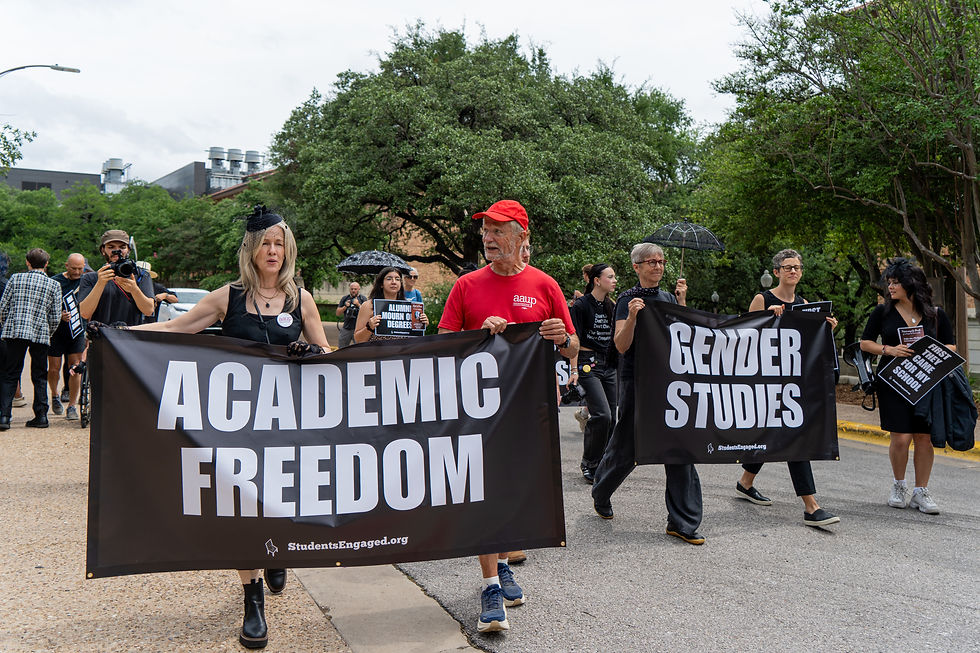 UT Austin staff and students held a funeral procession for academic freedom on campus. Photo by: CCR Studios.
