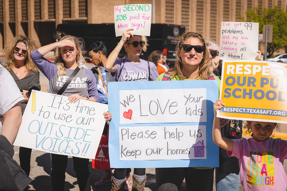 Attendees gather at the 2023 Public Education Advocacy Day, rallying with signs for respect for public schools.