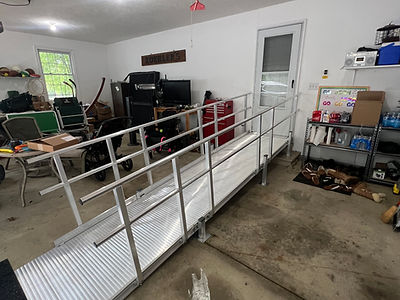 Aluminum modular wheelchair ramps installed in a garage