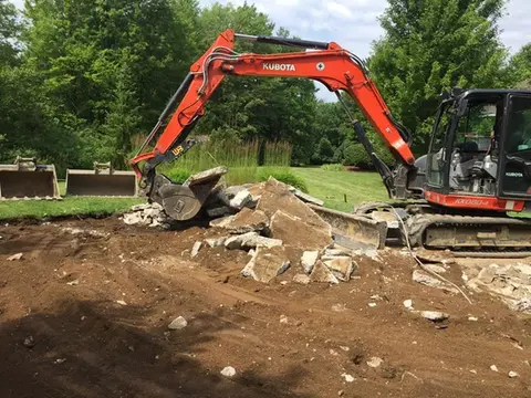 Excavator working on site improvement