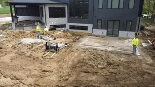 Workers on-site, demonstrating site improvement expertise.