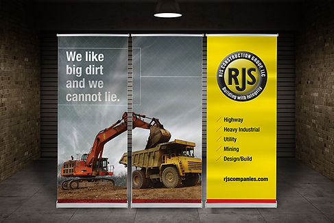 Trade show booth featuring large format banners and signage