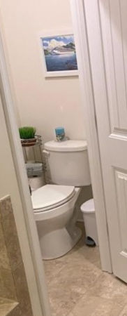 Accessible bathroom remodel with grab bar.