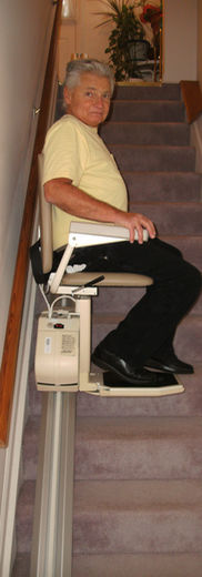 Elderly man on stairlift, independent living home remodel