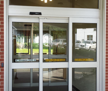 Automatic sliding glass door