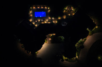 Illuminated property at night, reflecting site improvement
