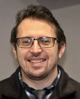 Smiling man wearing glasses, looking at the camera, Canton Ohio trusted advisors.