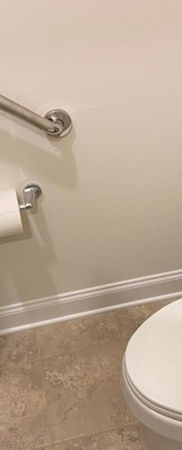 Accessible bathroom with grab bar for independent living