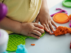 high-angle-kid-s-hands-with-playdough