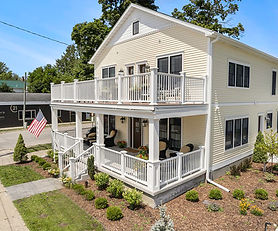 Building with 5 furnished luxury apartments and 5 car garage! 