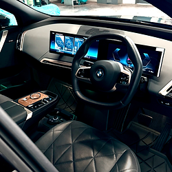 BMW car interior with steering wheel and dashboard