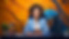 The Show page banner. A woman sitting behind a desk, doing a podcast. Microphones are on the desk with a laptop. A beautiful orange and blue abstract murual is behind her on the backwall.