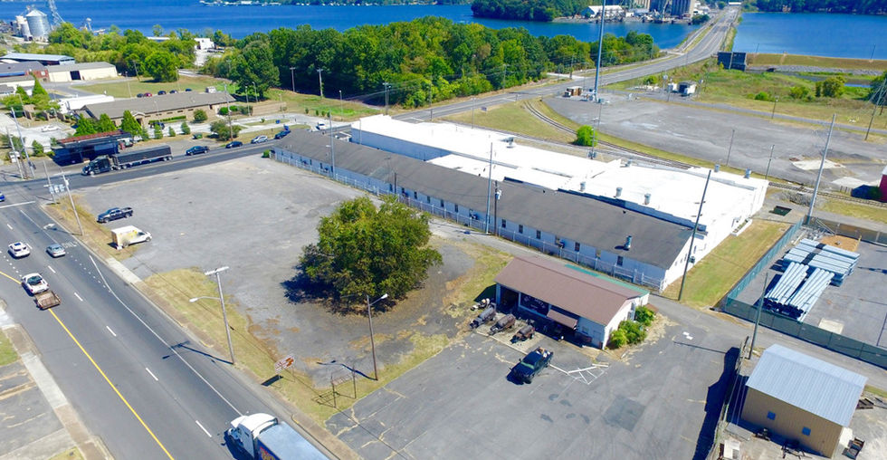 Exterior view of subject property. Guntersville Lake and rolling hills in view.