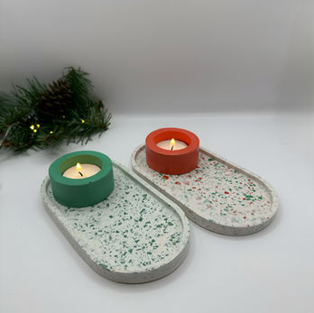 Our Christmas trinket trays, white with red and green terrazzo, with a green and red tea light holder on each