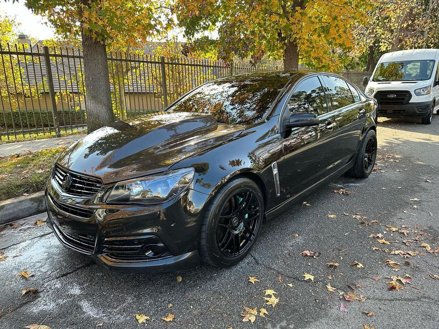 Sports car gleaming post-paint decontamination by Diabolic Detailing in Riverside