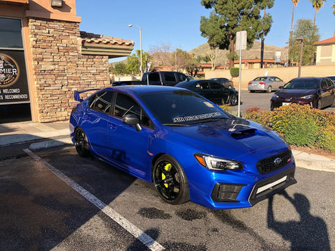 Diabolic Detailing mobile service in action on a subaru in Riverside