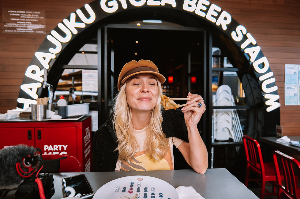 Blonde girl eating gyoza in Brisbane Australia Harajuku