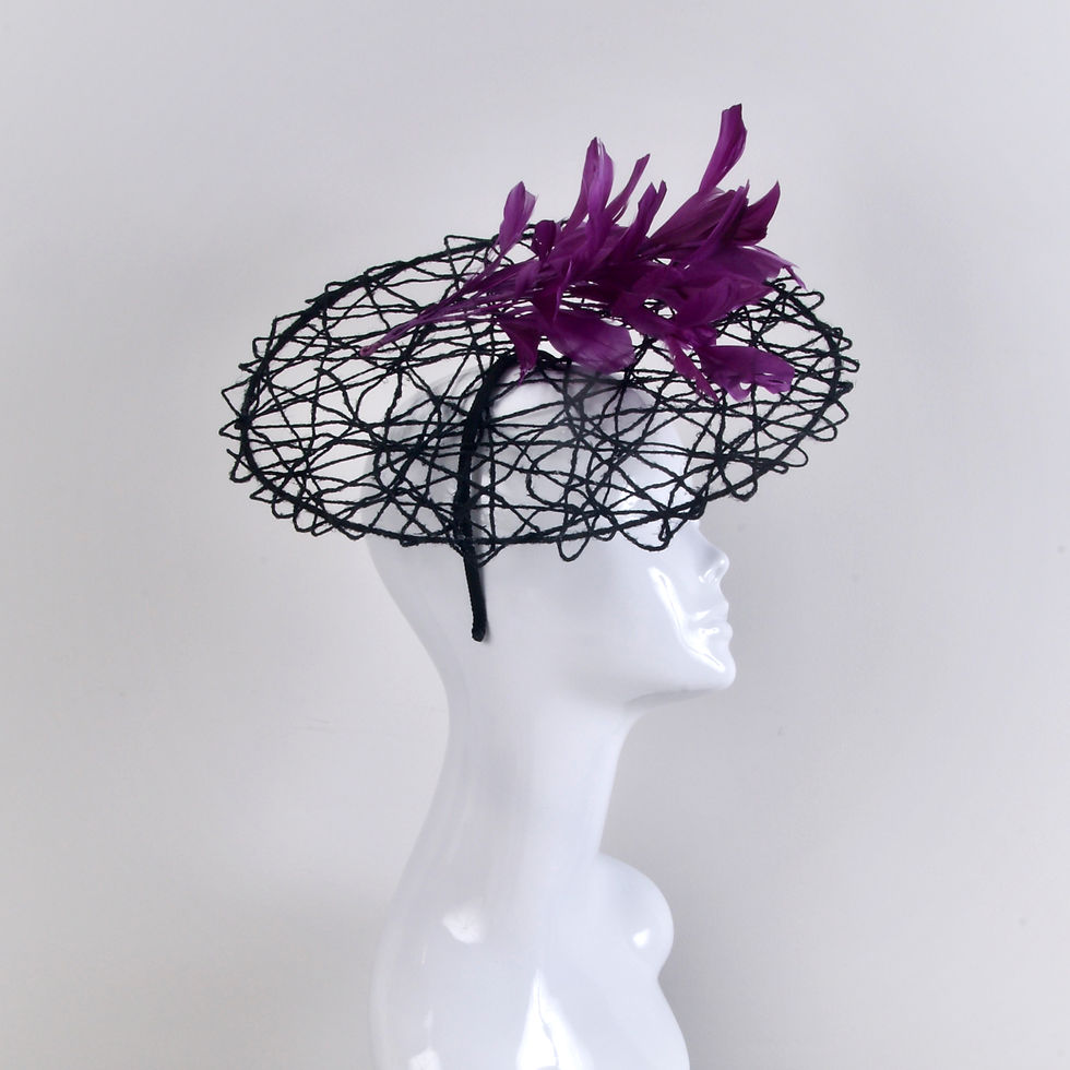 Thumbnail: Black fascinator with plum feathers side view