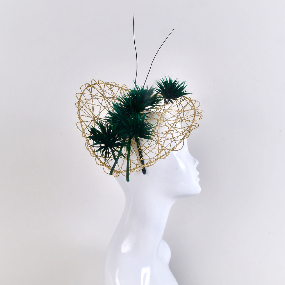 Thumbnail: Gold lattice twine hat and dark green feathers and quills fascinator side view