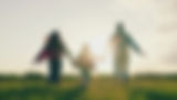 Children, parents relax carefree. Happy family run holding hands in park sunset. Family wa