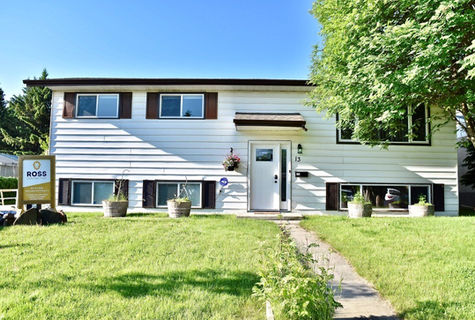 Before and after renovation photos, exterior home. Red Deer construction experts, Red Deer builders, Ross Contracting.