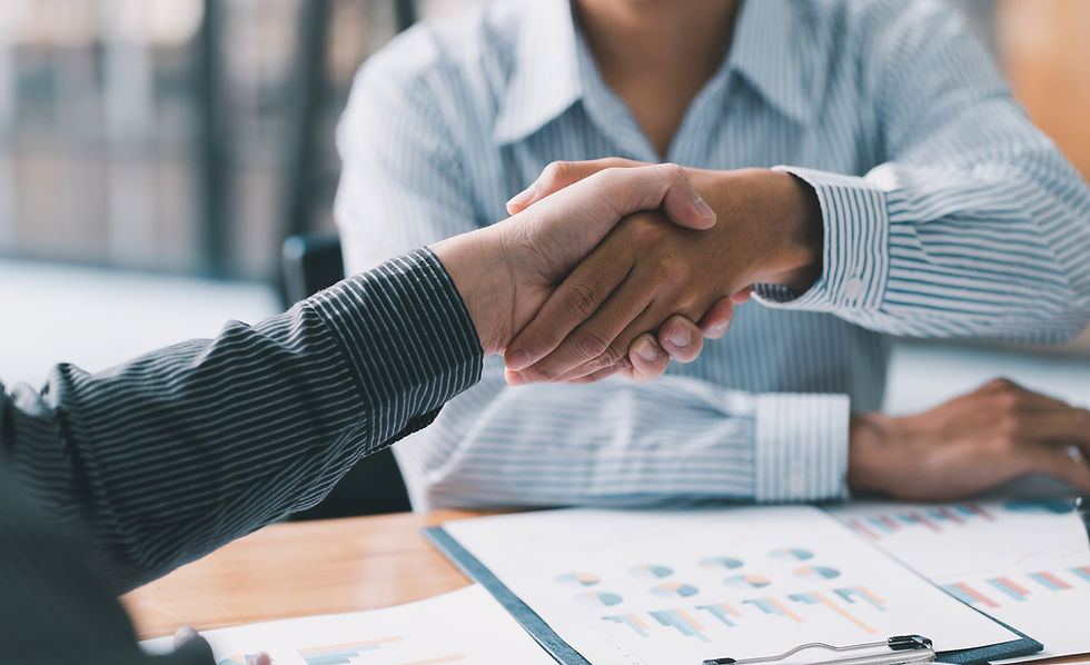 medium-vecteezy_businesspeople-are-shaking-their-hands-after-signing-a_7359632_medium_edit
