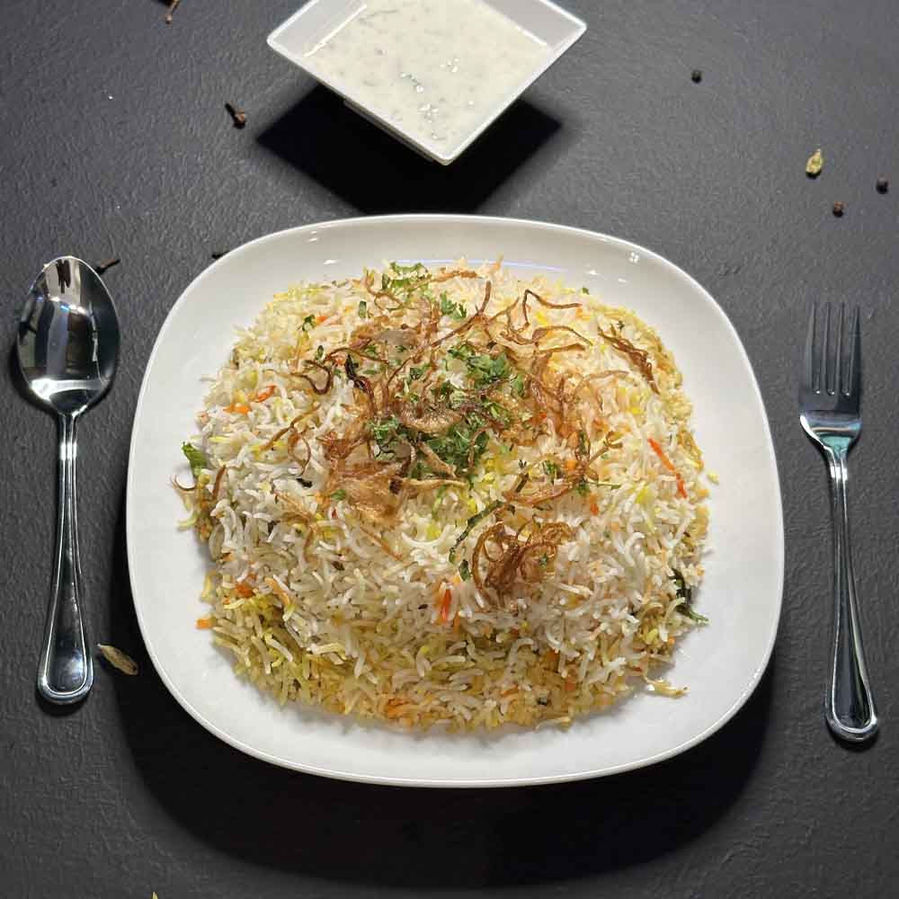 HYM | برياني عيسى بالدجاج نصف