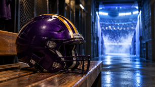 Blank purple and gold football helmet on a visiting locker-room bench facing a blue-lit stadium tunnel