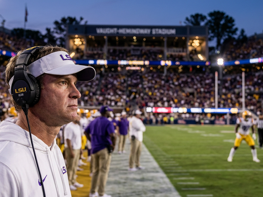LSU head coach on the sideline for the 2026 LSU vs. Ole Miss prediction article