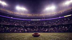 Football resting on the turf inside a massive purple-and-gold-lit stadium at night before LSU hosts Texas A&M