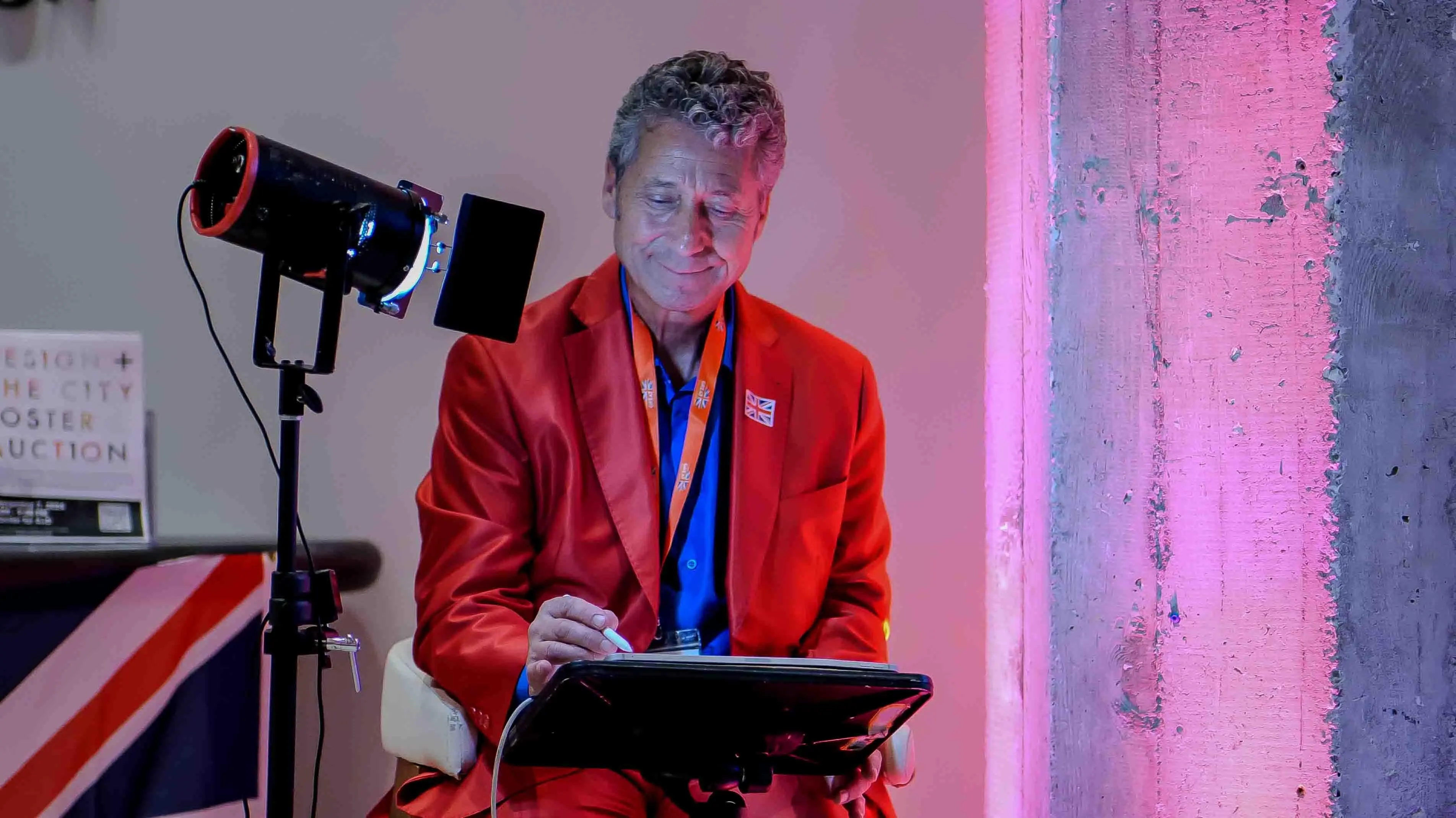 Jeremy Sutton, live event painter from Jeremy Sutton Studio, creating digital artwork during the Virgin Atlantic and British Consulate 30-year celebration event in San Francisco.