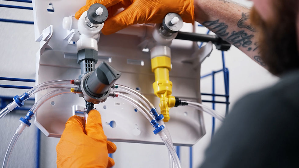 Close-up of technician demonstrating equipment workflow for an instructional training video