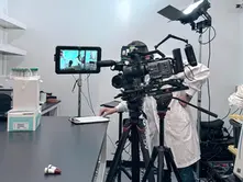 Bidar Video filming a step-by-step biotech training video in Gondola Labs, Palo Alto, CA, with a Sony cinema camera, monitor, lighting, and controlled on-set setup designed to capture every detail clearly.