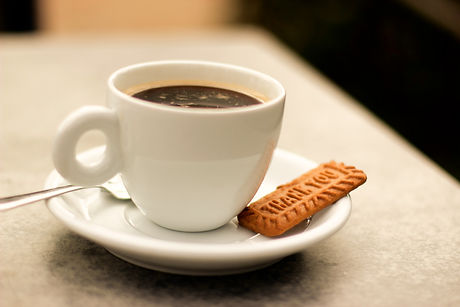 white ceramic cup with coffee_edited.jpg