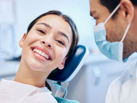 Smiling patient after tooth extraction consultation at Henley Dental in Homebush West