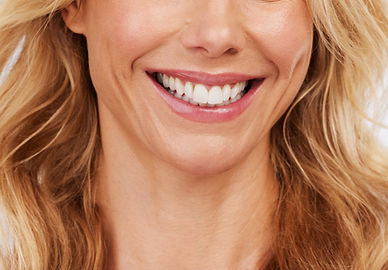 closeup-smile-and-woman-mouth-in-studio-for-denta-2023-11-27-05-08-25-utc.jpg