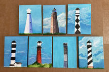 Acrylic original painting called Famous North Carolina Lighthouses (2025) by Donna Liguria is a group of 7 NC Lighthouses