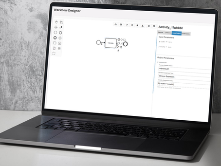 A laptop with a workflow tool showing