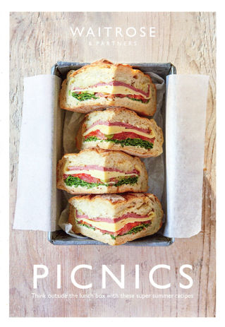 Four sandwich halves in cardboard box with baking paper for front page of Waitrose picnic recipie card 