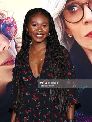 Jamilah Rosemond smiling at the Moving on Movie Premiere
