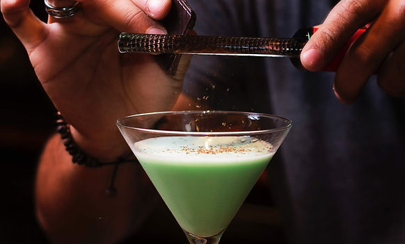 Mixologist crafting Martini