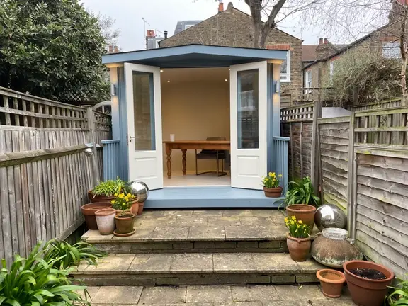 04. Ali's Garden Office after (door open)