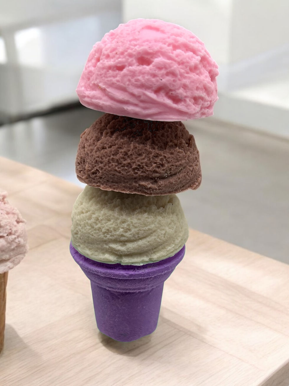 Thumbnail: Three scoops ice cream: strawberry, chocolate, vanilla