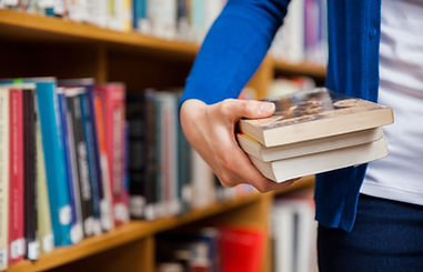 Person carrying library books