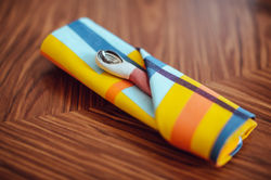 Napkin close up with ceramic spoon